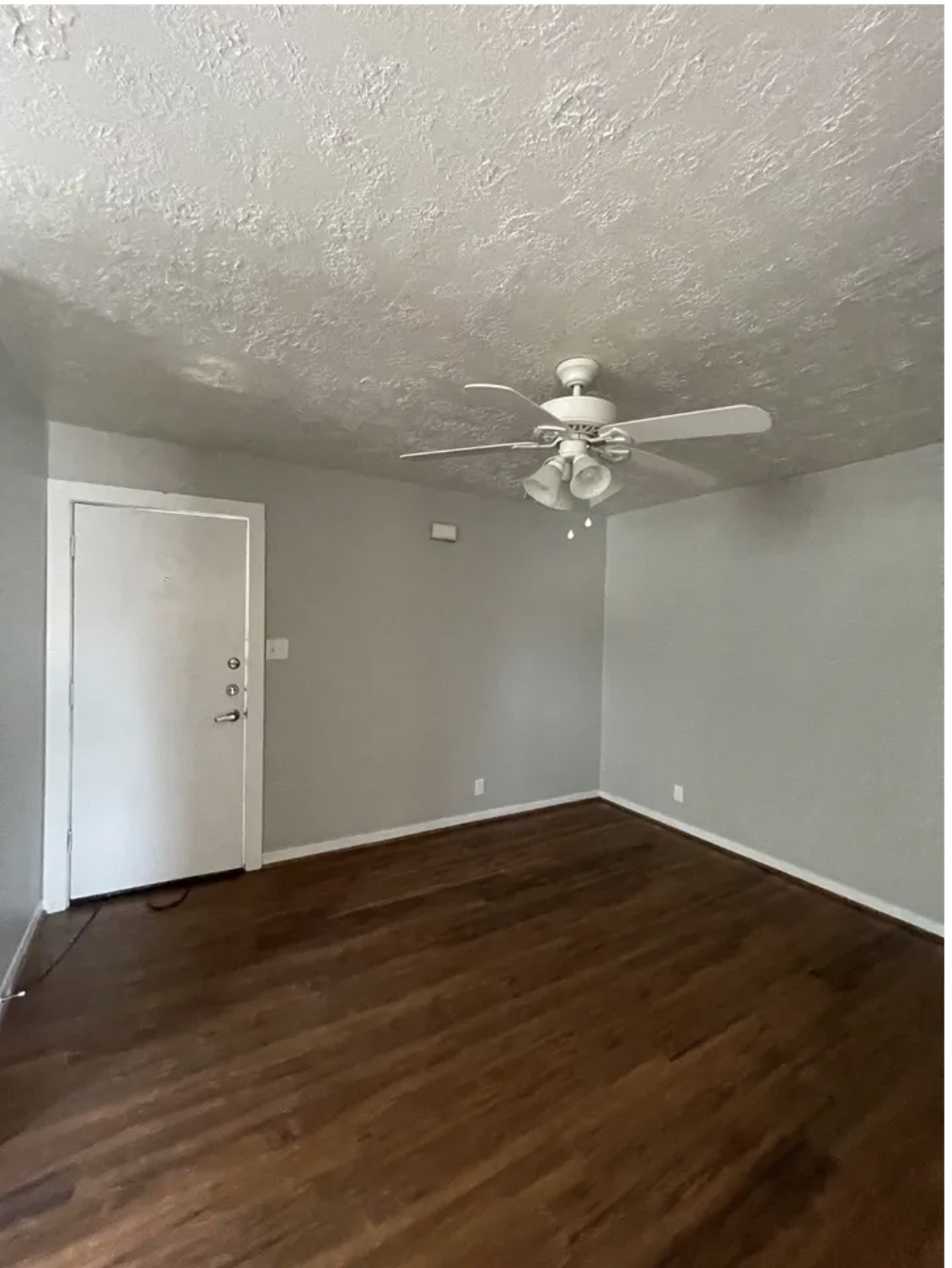 1014 East 23rd Street, Unit 3 Bryan, TX 77803 - Photo 2 of 8 a view of a room with wooden floor