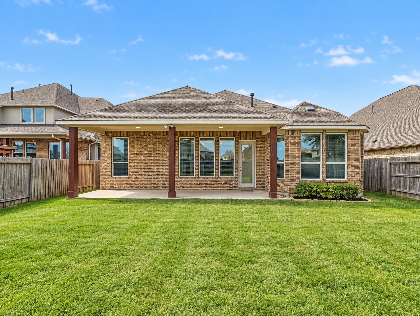 20306 Windsor Field Spring, TX 77379 - Photo 33 of 37 Vast backyard area with a covered patio and no back neighbors