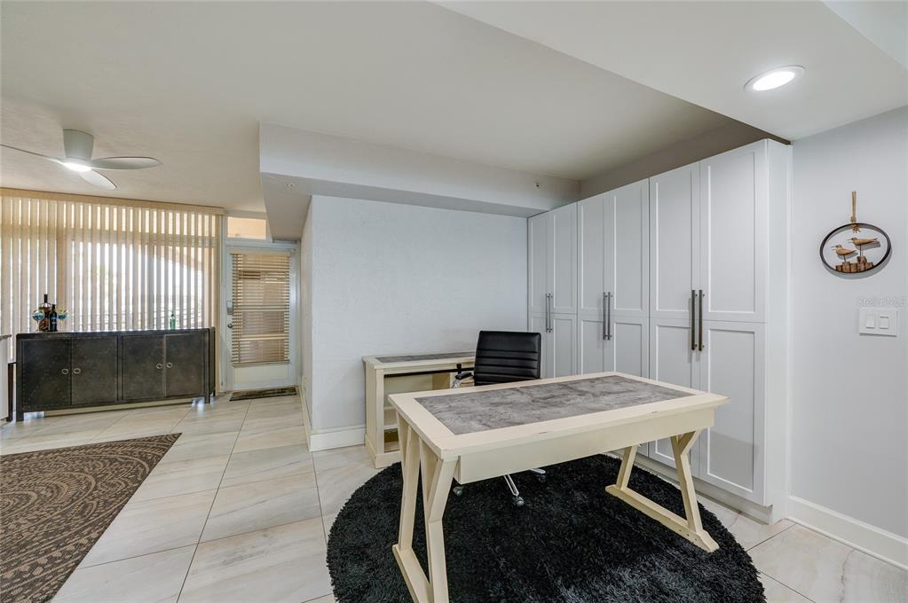 4575 South Atlantic Avenue, Unit 6304 Ponce Inlet, FL 32127 - Photo 2 of 37 a view of a kitchen with a table and chairs