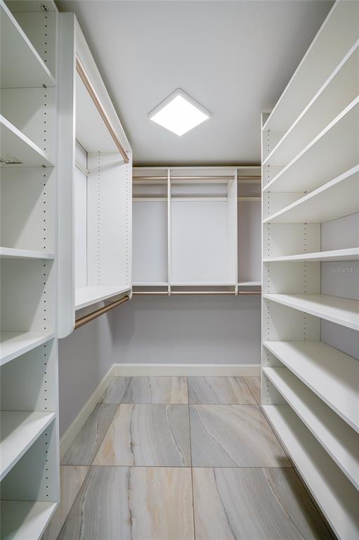 4575 South Atlantic Avenue, Unit 6304 Ponce Inlet, FL 32127 - Photo 21 of 37 a view of an empty walk in closet