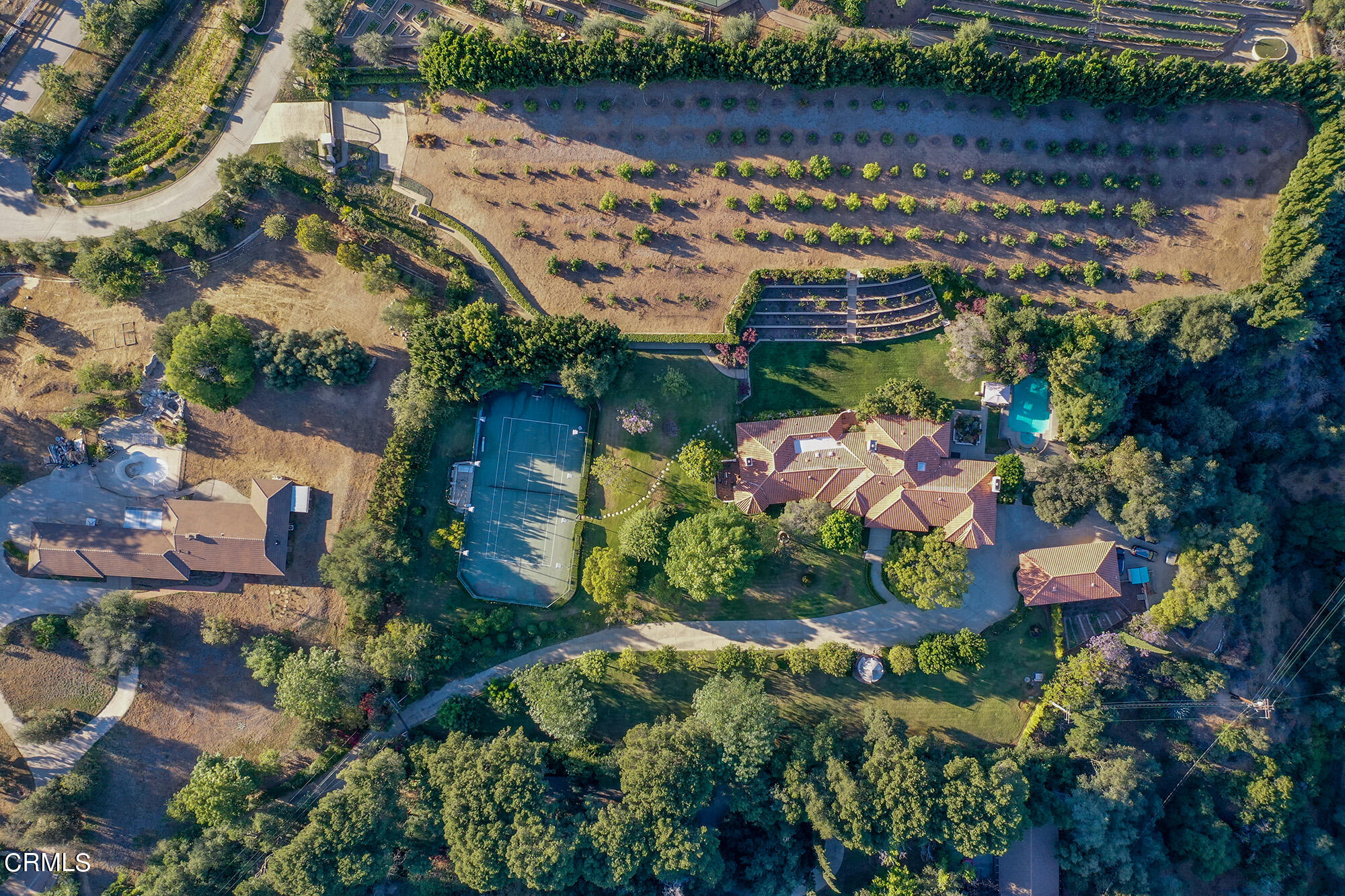 an aerial view of residential house with outdoor space and lake view