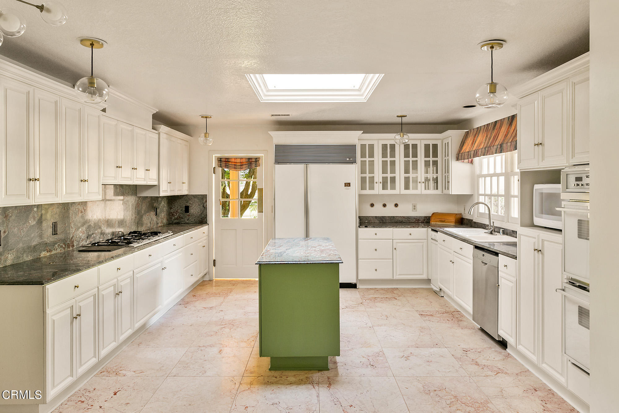 673 Deodar Lane Bradbury, CA 91008 - Photo 12 of 25 a large kitchen with stainless steel appliances granite countertop a stove and cabinets