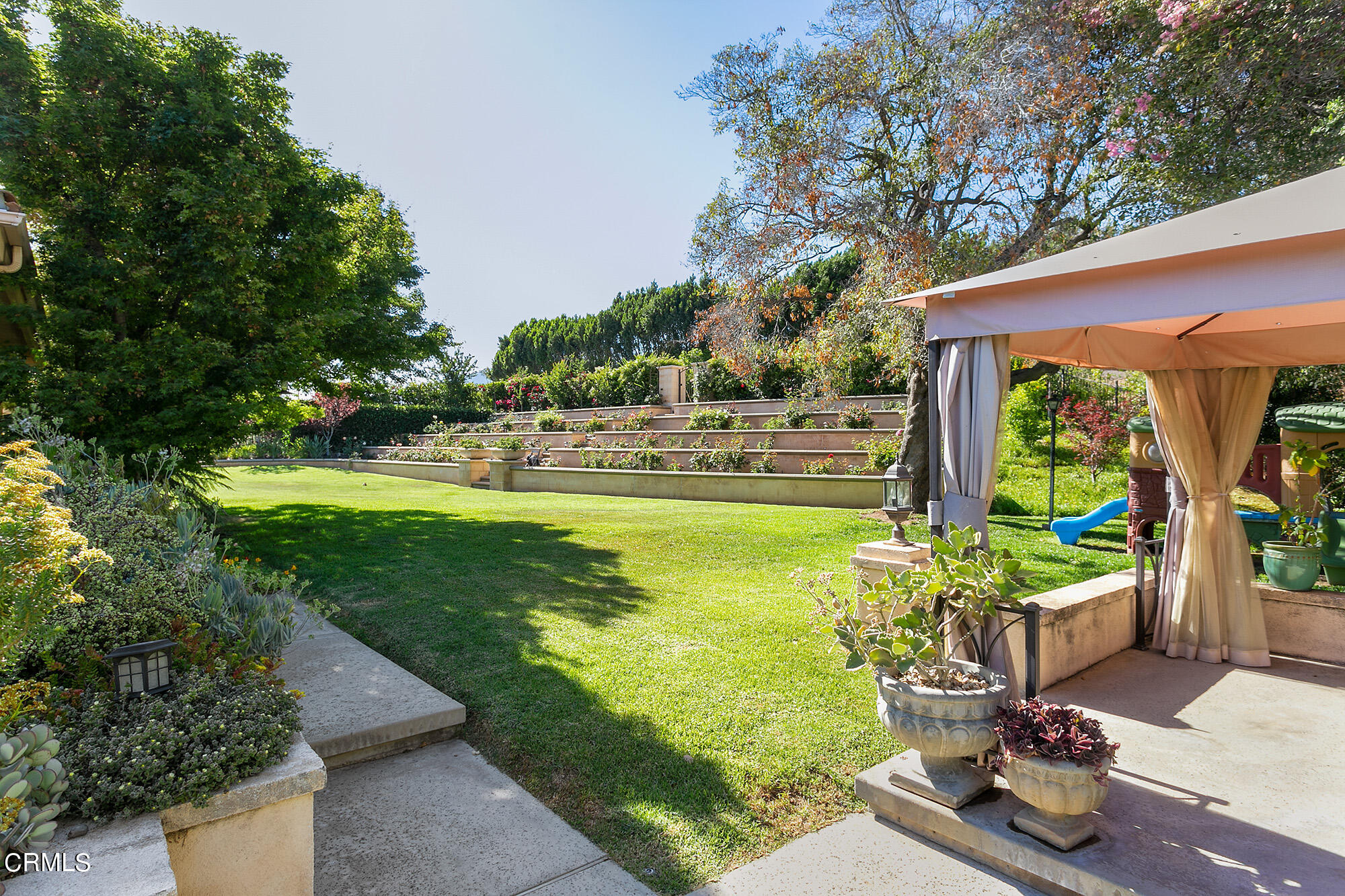 673 Deodar Lane Bradbury, CA 91008 - Photo 16 of 25 a view of a swimming pool with a patio