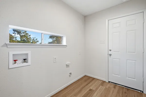 a view of small space with wooden floor