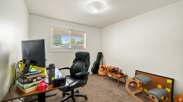 141 East 550 North Springville, UT 84663 - Photo 16 of 28 Third bedroom with a ceiling-mounted light fixture, a window featuring blinds & neutral carpeting