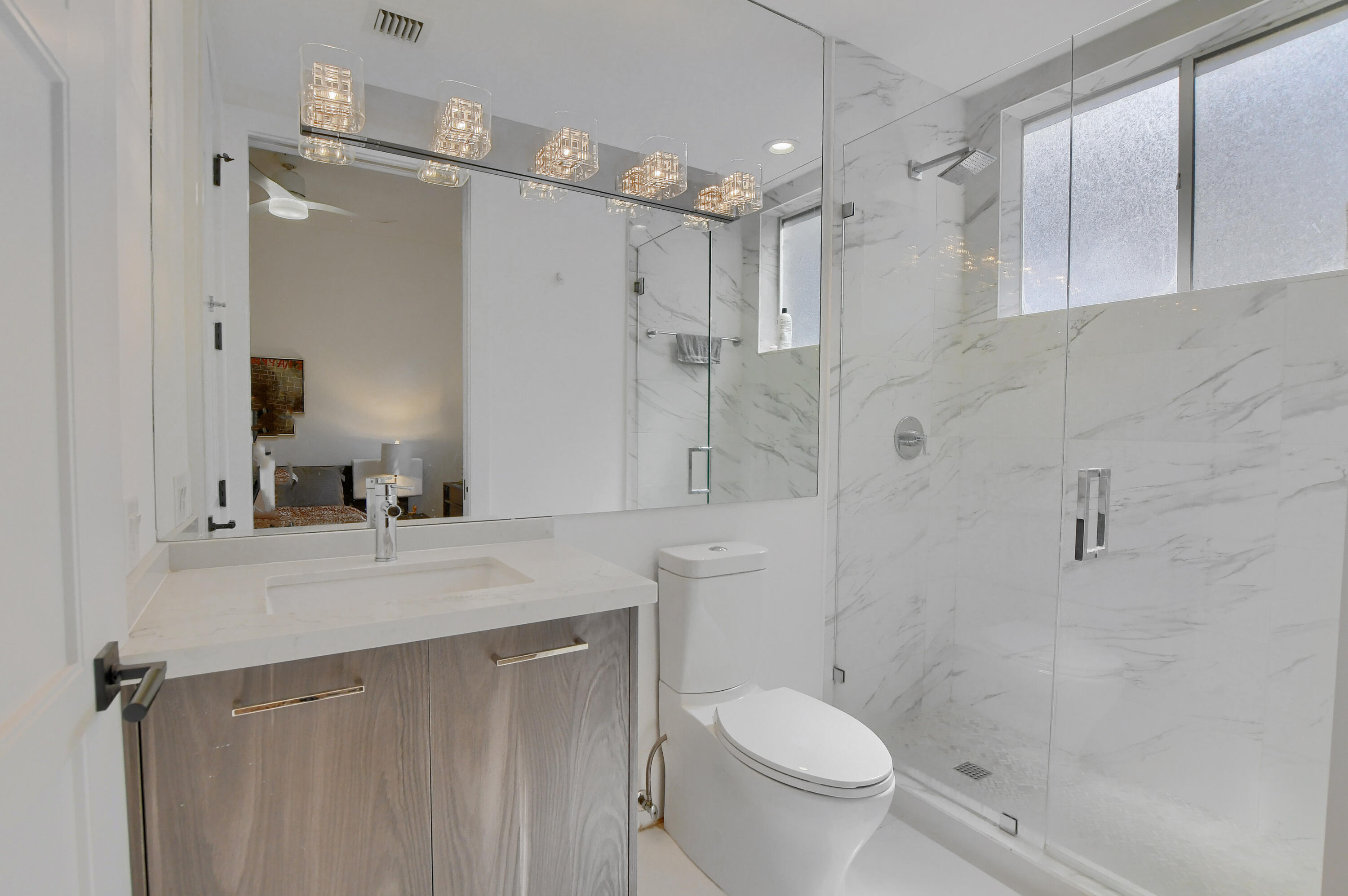 2548 Coco Plum Boulevard, Unit 704 Boca Raton, FL 33496 - Photo 31 of 39 GUEST BATHROOM
