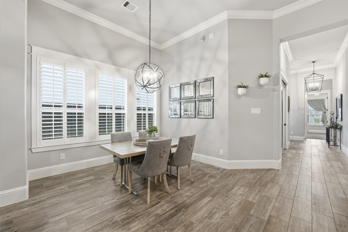 2172 Rope Maker Road Conroe, TX 77384 - Photo 15 of 50 HUGE Breakfast area that can accommodate a large table. This room is in the center of the home and is sure to be a gathering spot!