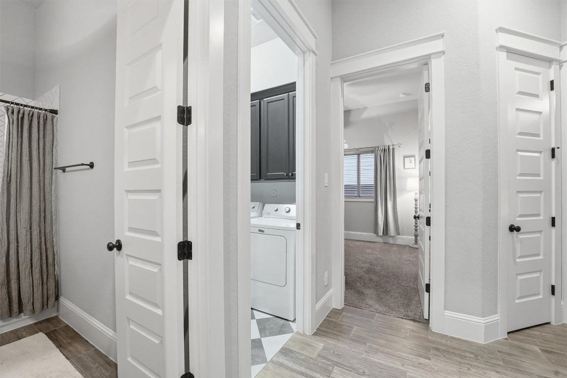 2172 Rope Maker Road Conroe, TX 77384 - Photo 29 of 50 Rooms are nicely laid out down this hallway; there is even a linen closet! Tons of storage for everything you need!