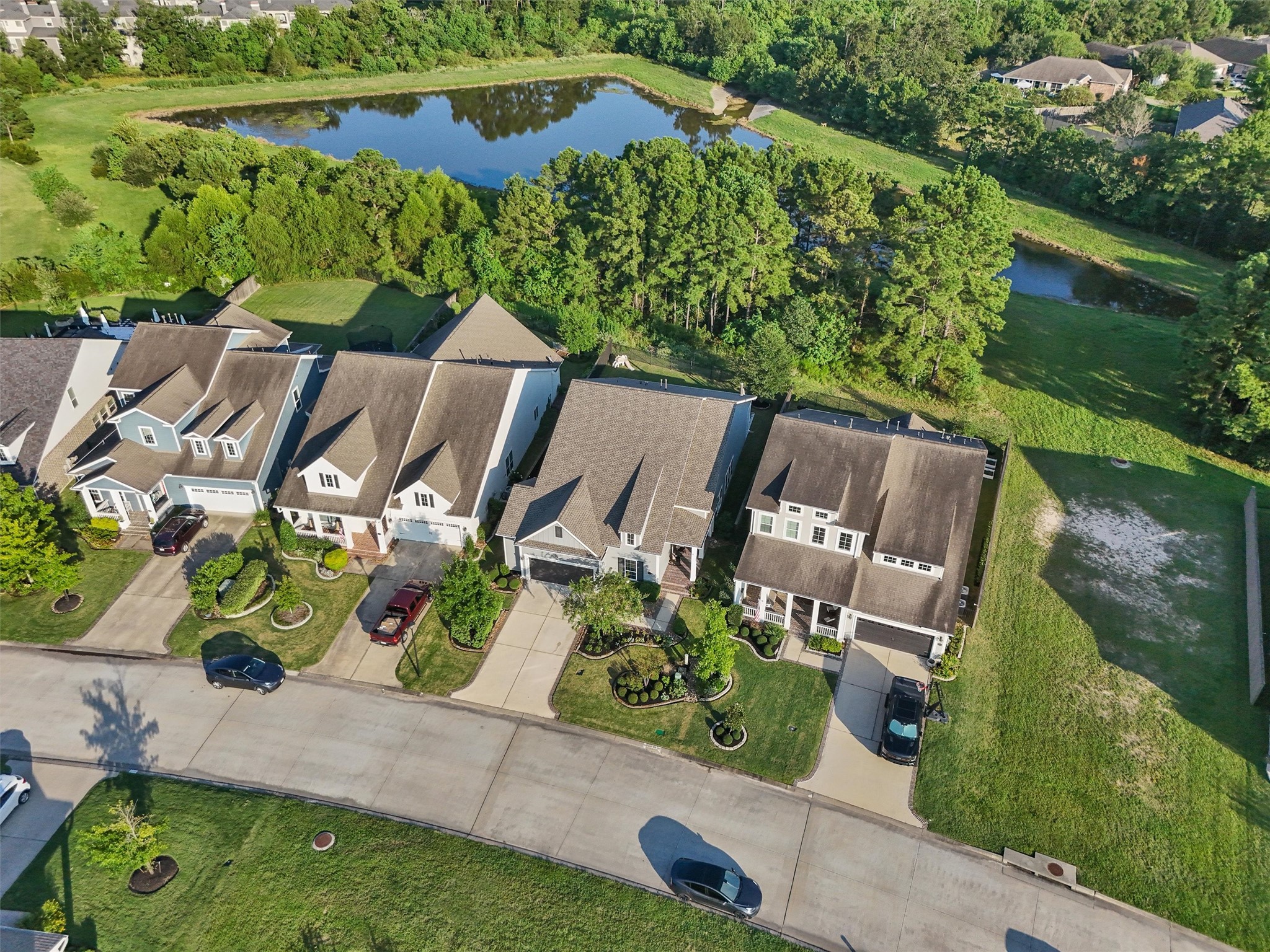 2172 Rope Maker Road Conroe, TX 77384 - Photo 39 of 50 an aerial view of a house with garden space and street view