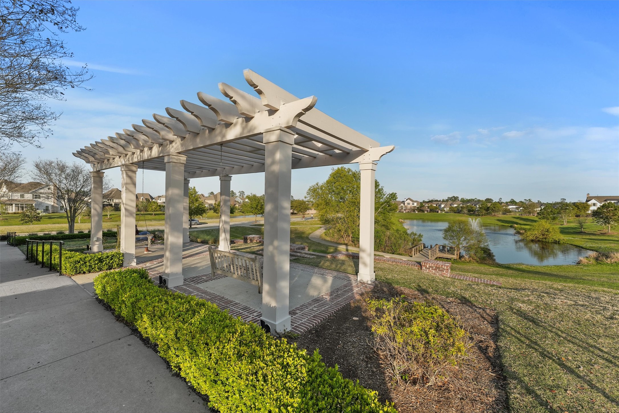2172 Rope Maker Road Conroe, TX 77384 - Photo 48 of 50 a view of a balcony with lake view and a floor to ceiling window
