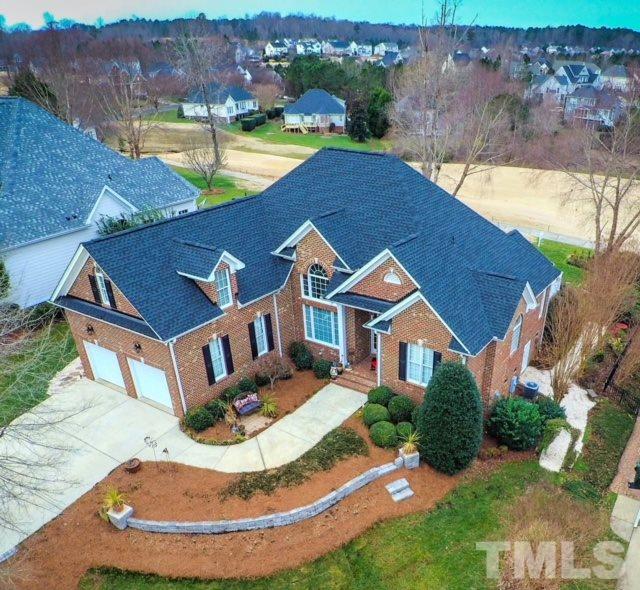 Beautiful all brick custom built home with $47,000 upgrades recently. Situated on the 18th Fairway and Lake of Eagle Ridge Golf Course in Raleigh. 2900 SF of exquisite living space.