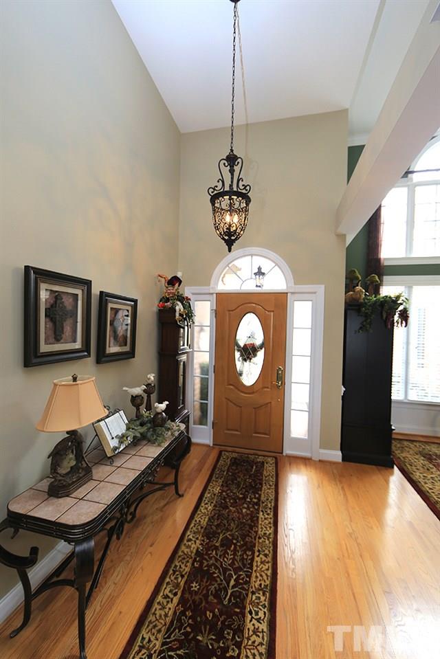 521 Competition Road Raleigh, NC 27603 - Photo 2 of 25 Grand foyer with gleaming hardwood floors and new foyer chandelier.