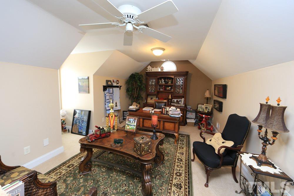 521 Competition Road Raleigh, NC 27603 - Photo 18 of 25 In original plan this was the bonus but should be considered for resale purposes as third bedroom with closet and full bath. TEEN SUITE, MOTHER-N-LAW suite possible. ALL kinds of possibilities.