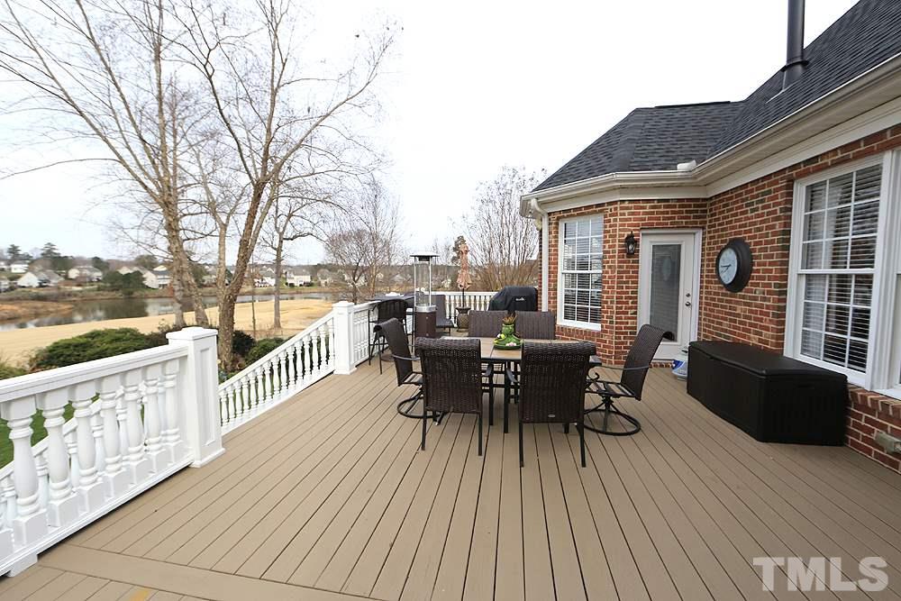 521 Competition Road Raleigh, NC 27603 - Photo 21 of 25 This massive 26x16 entertaining deck is delightful and the sunsets are breathtaking! Custom built and recently painted this deck has entrances from the breakfast room and master suite. Sit at night and enjoy the sunsets or entertain a large group.