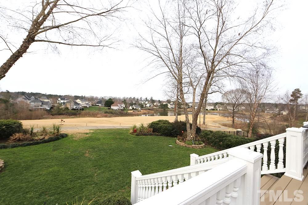 521 Competition Road Raleigh, NC 27603 - Photo 22 of 25 Sit on your massive deck and see all the sights and views of the signature 18th fairway and lake of Eagle Ridge Golf Course. Just steps from the clubhouse and restaurant but far enough. Golf range is walking distance and salt water pool/tennis too.