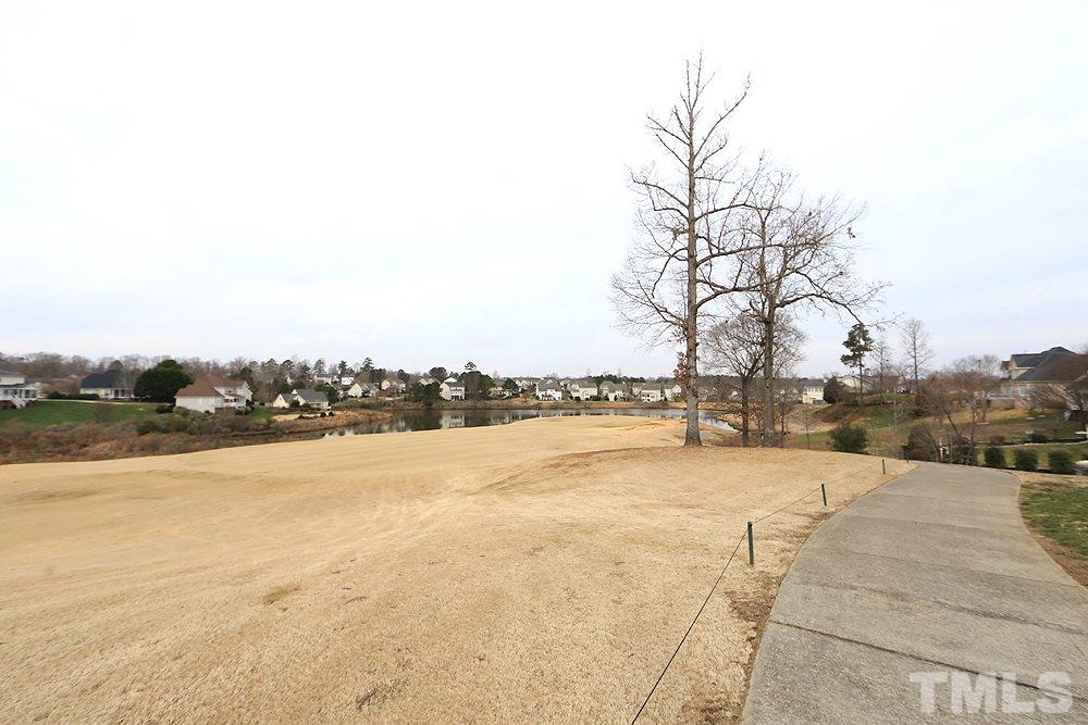 521 Competition Road Raleigh, NC 27603 - Photo 23 of 25 New champion Bermuda greens were installed and this spring your golf friends will be green with envy of this view and home.