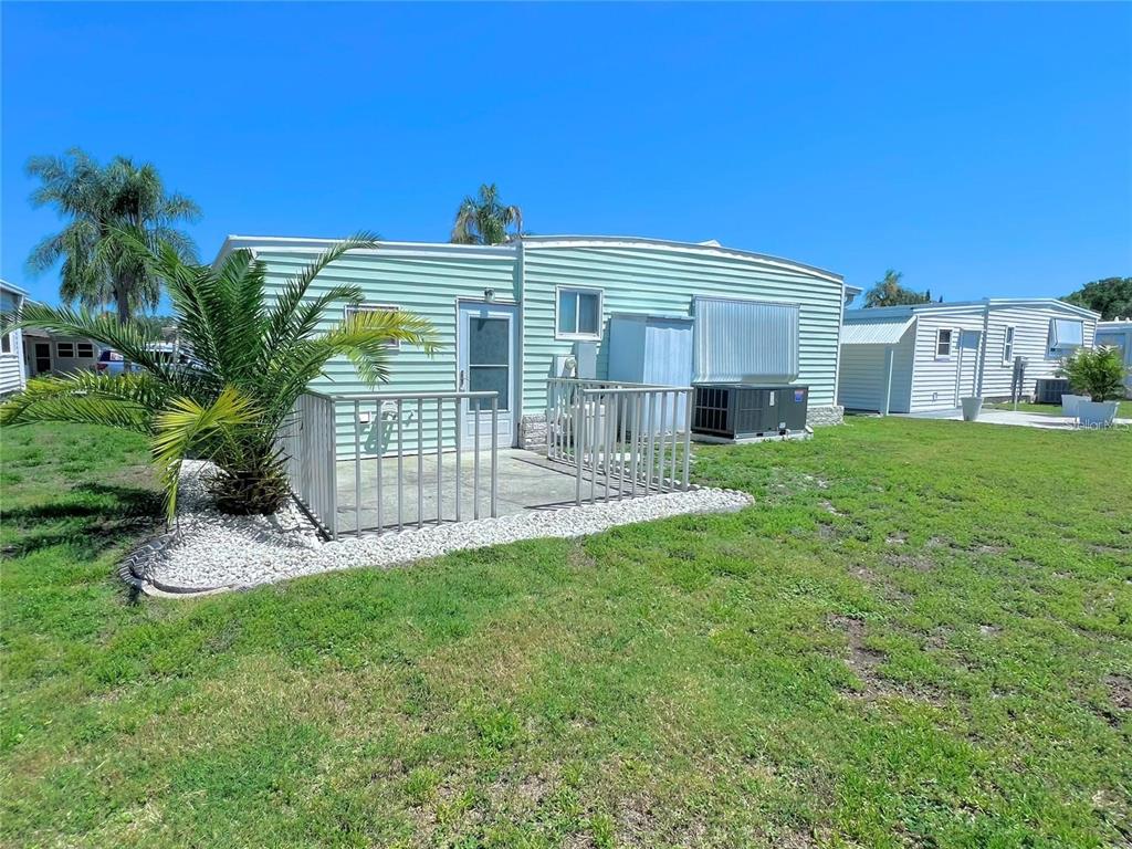 1100 South Belcher Road, Unit 772 Largo, FL 33771 - Photo 5 of 84 a view of a house with a yard