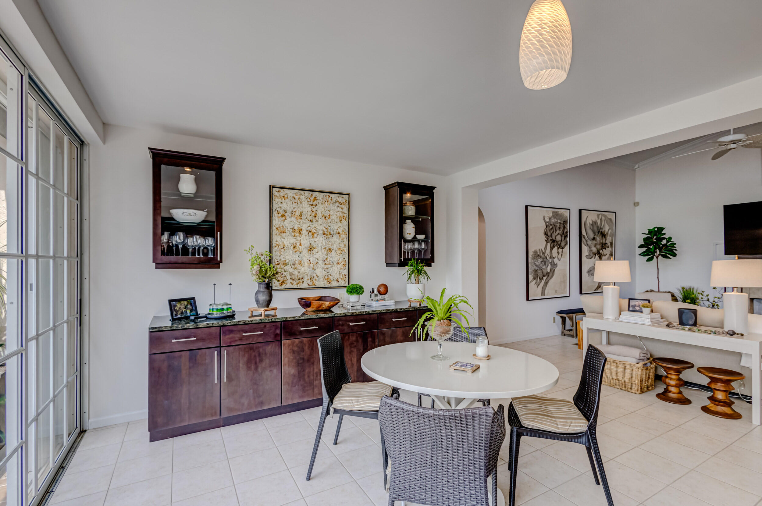3546 Lantern Bay Drive Jupiter, FL 33477 - Photo 12 of 25 a view of a dining room with furniture and window