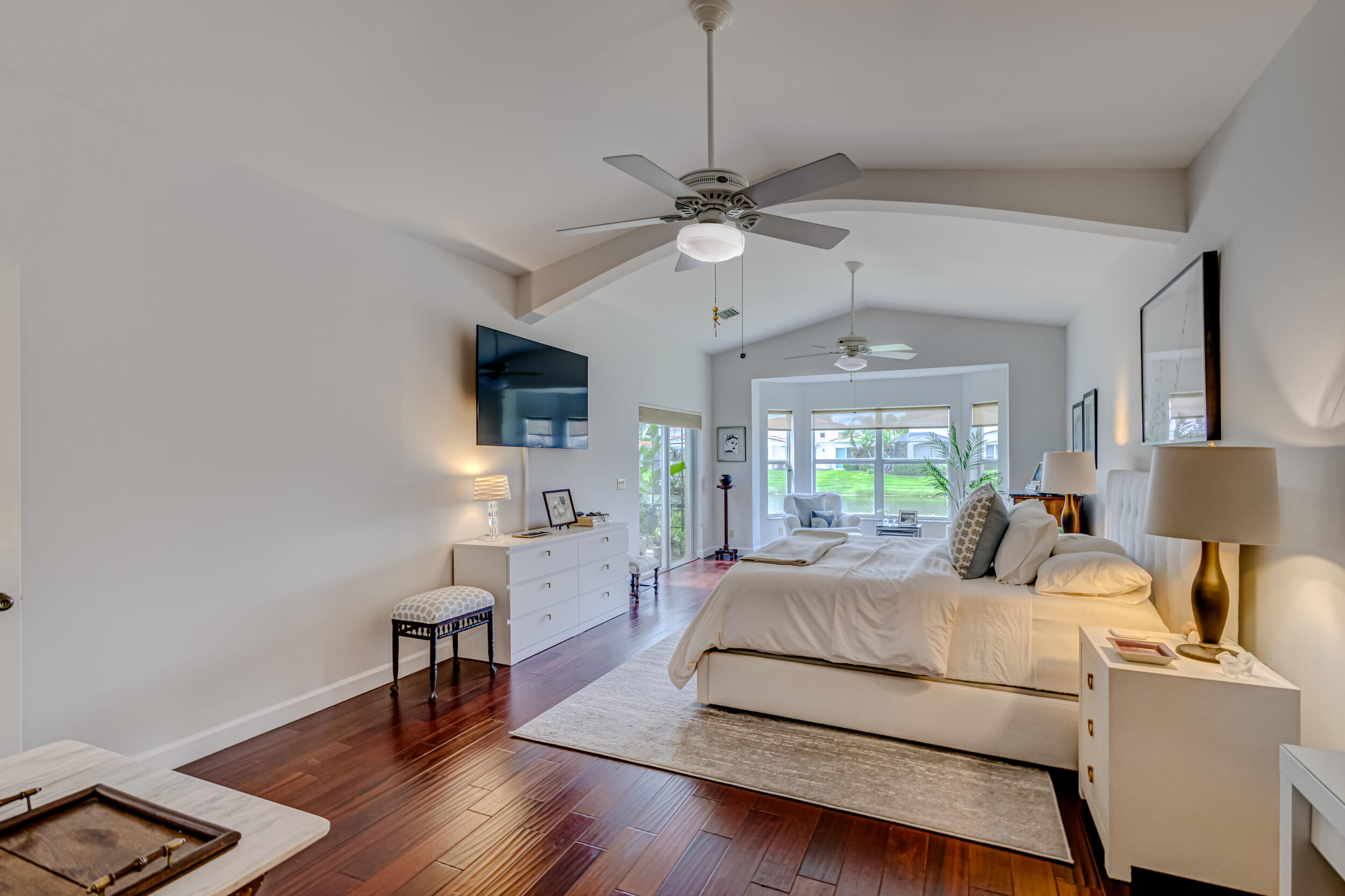 3546 Lantern Bay Drive Jupiter, FL 33477 - Photo 13 of 25 a bed room with a bed window and a chair
