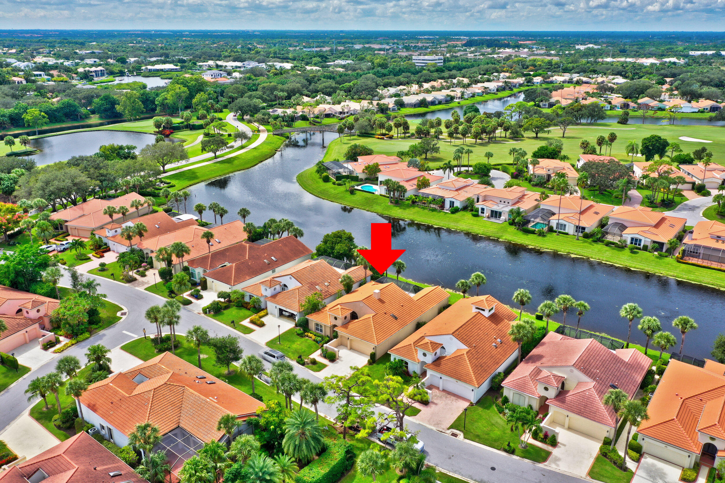 3546 Lantern Bay Drive Jupiter, FL 33477 - Photo 24 of 25 an aerial view of residential houses with outdoor space and lake view