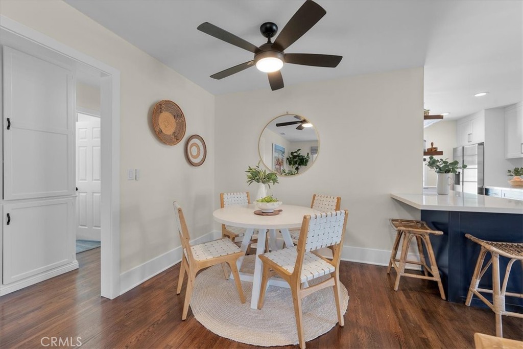 15519 Roselle Avenue Lawndale, CA 90260 - Photo 11 of 28 a view of a dining room with furniture wooden floor and a chandelier