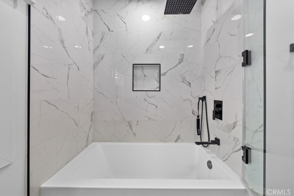 15519 Roselle Avenue Lawndale, CA 90260 - Photo 18 of 28 a bathroom with a bathtub