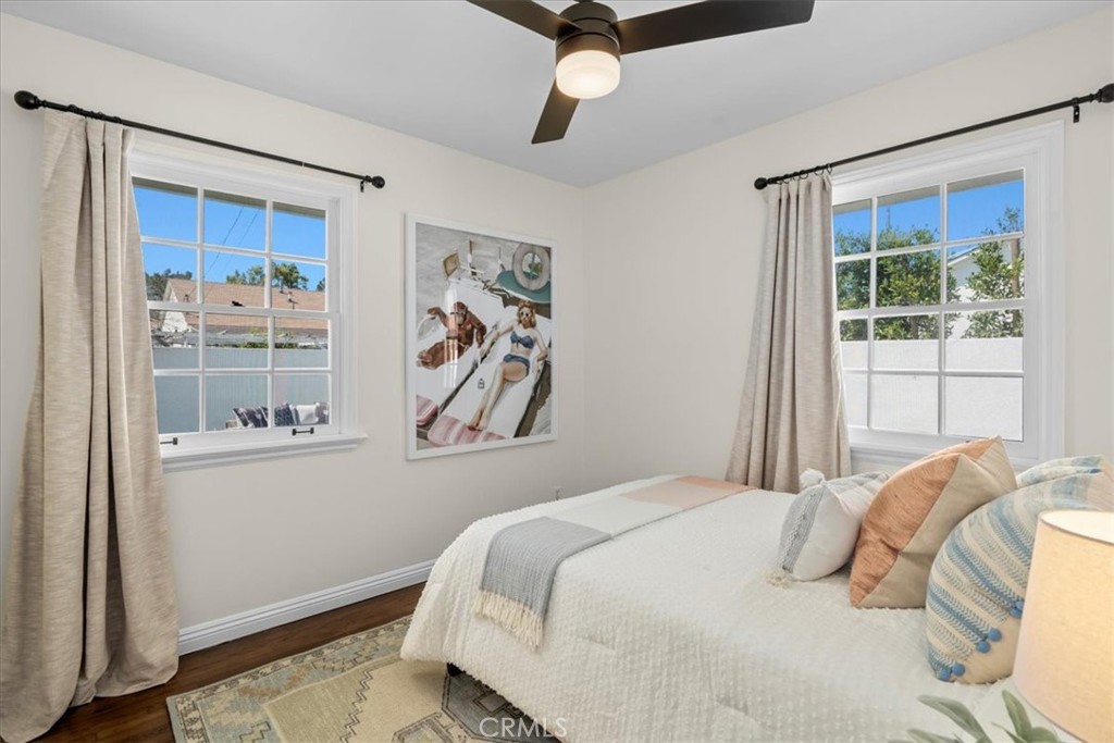 15519 Roselle Avenue Lawndale, CA 90260 - Photo 20 of 28 a bedroom with a bed and a window