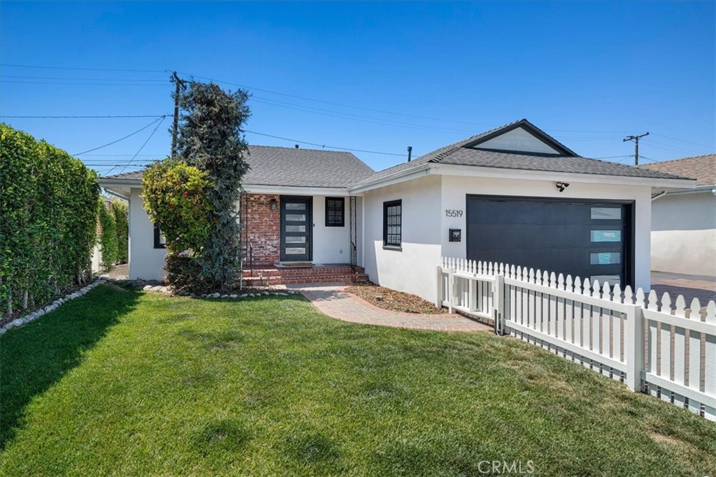 15519 Roselle Avenue Lawndale, CA 90260 - Photo 2 of 28 a view of a house with a yard and porch
