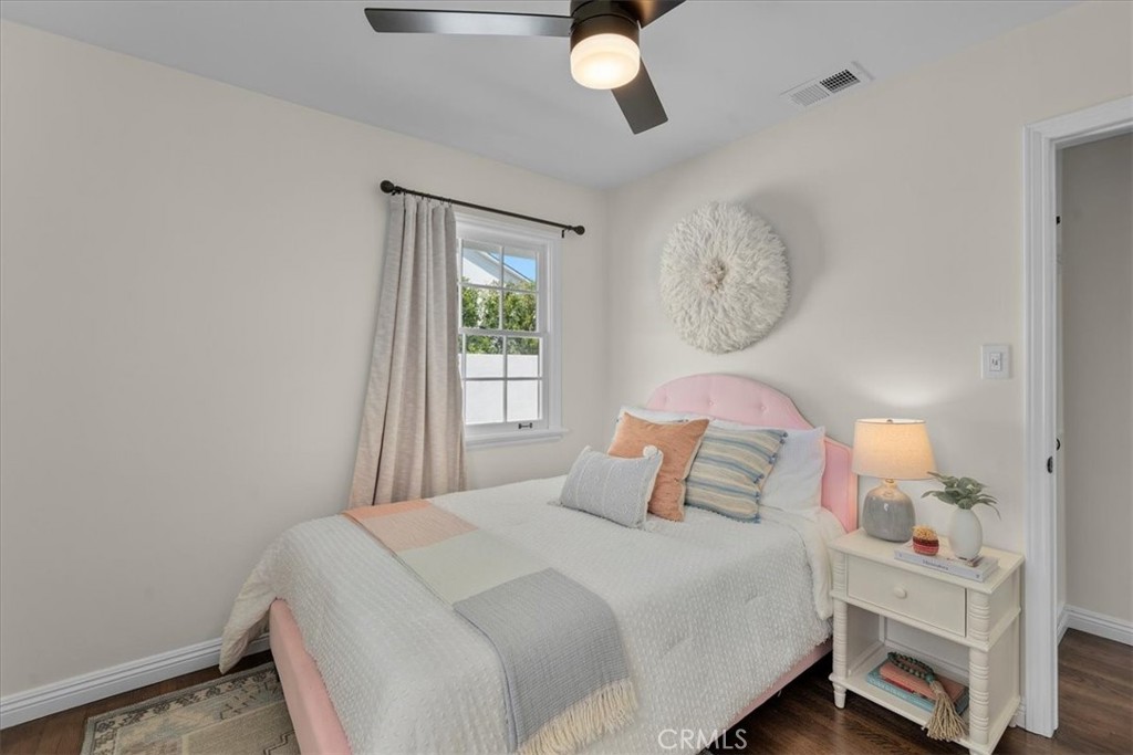 15519 Roselle Avenue Lawndale, CA 90260 - Photo 21 of 28 a bedroom with a bed and a window