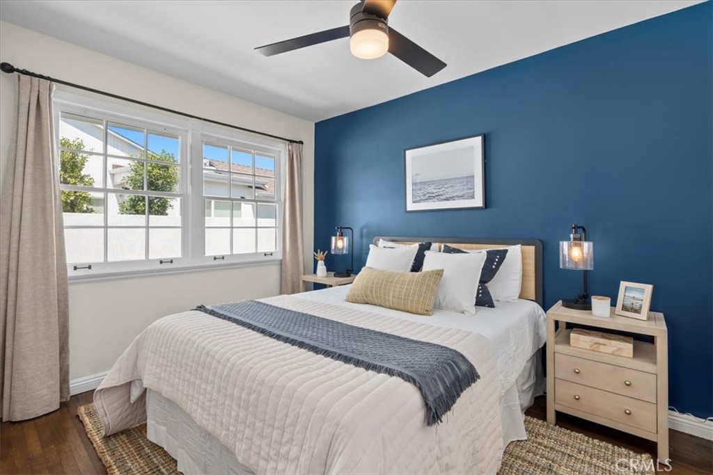 15519 Roselle Avenue Lawndale, CA 90260 - Photo 24 of 28 a bedroom with a bed and a window