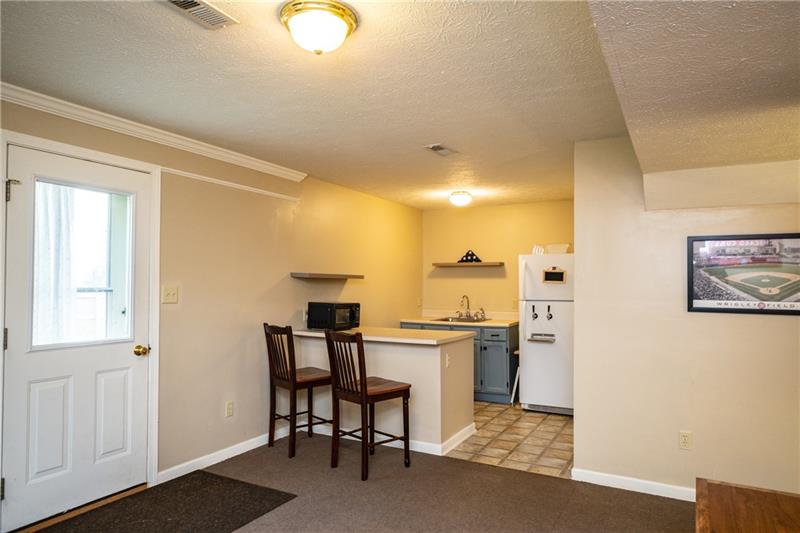 1067 Rural Ridge Drive Cheswick, PA 15024 - Photo 22 of 25 View of the Kitchenette. Loving the Color of the Cabinets!! The Beer Frig Does Convey With the Property. Your Welcome!
