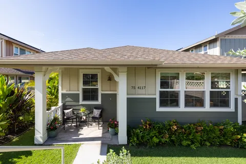 a view front of house with outdoor seating