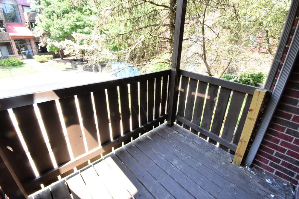 1330 Brook Street, Unit M St. Charles, IL 60174 - Photo 11 of 11 a view of balcony with wooden floor