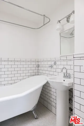 a bathroom with a sink and a bathtub