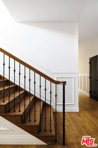 a view of a hallway with staircase