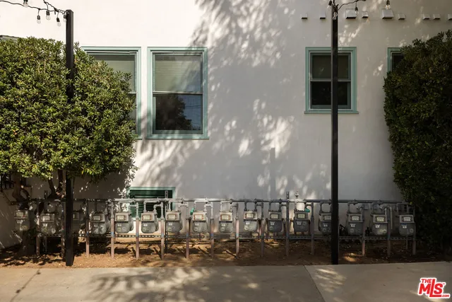 a view of a tree in front of a house