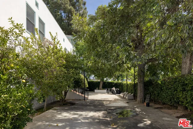 a view of street with parked cars