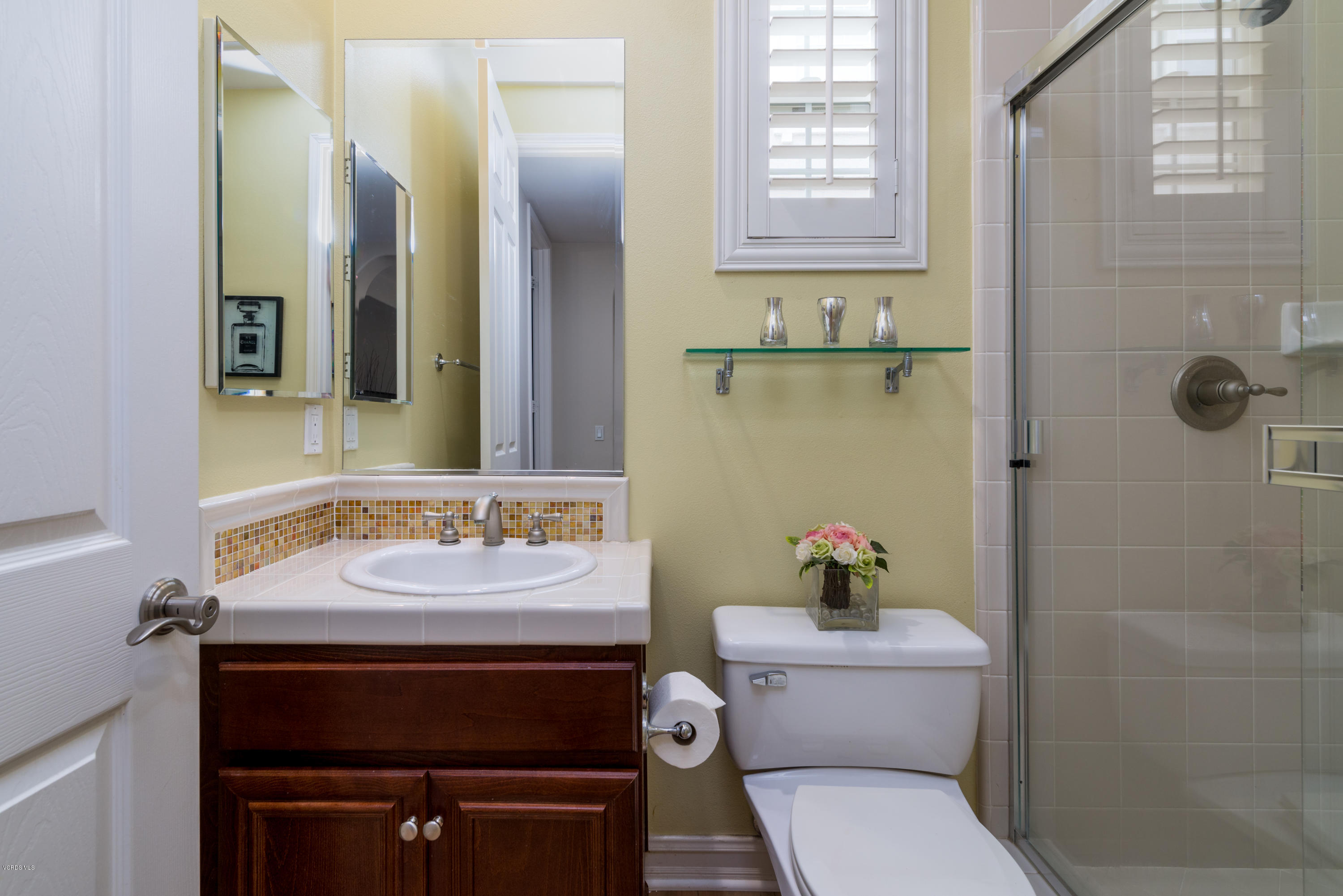 310 Spring Park Road Camarillo, CA 93012 - Photo 11 of 48 a bathroom with a sink toilet and shower