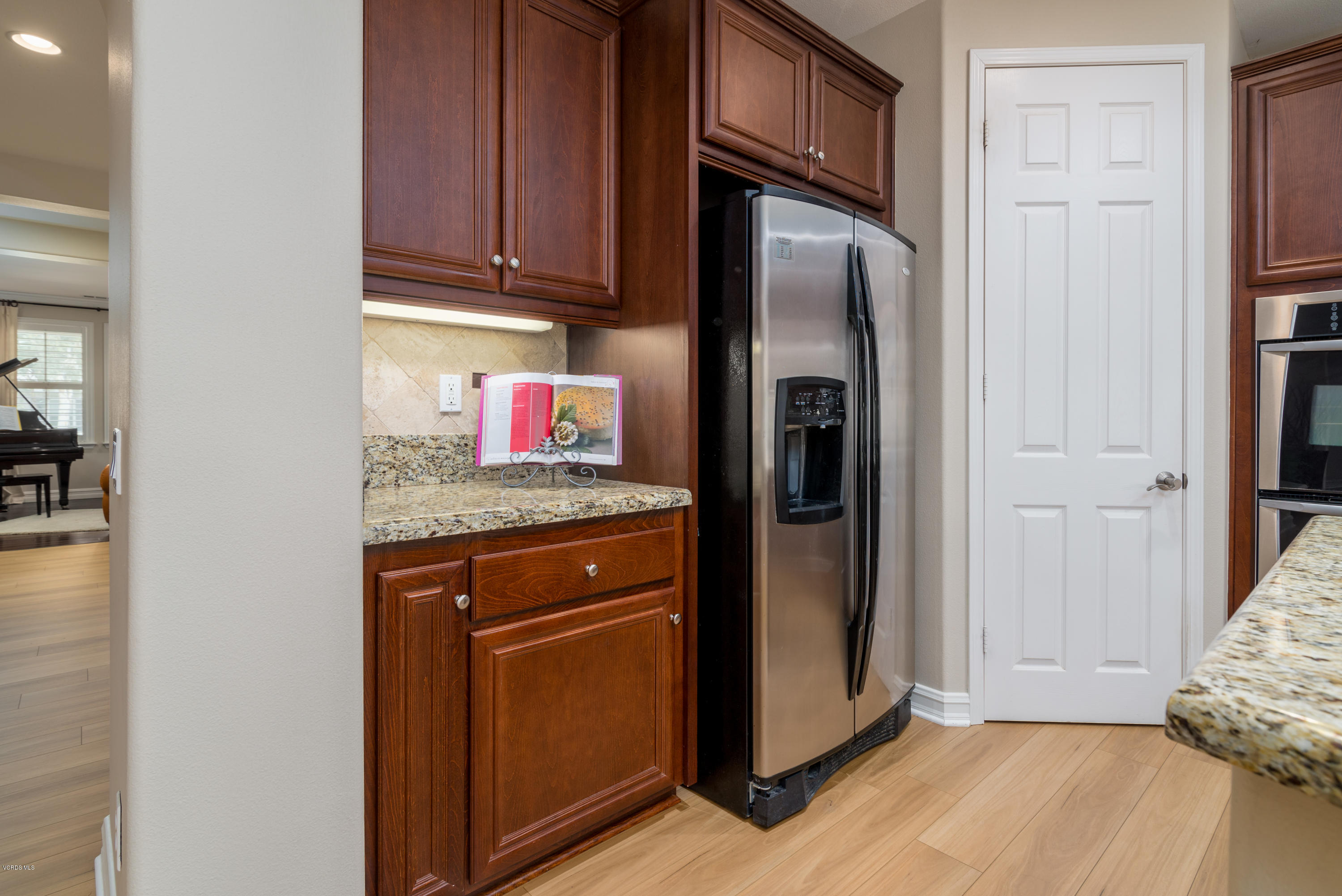 310 Spring Park Road Camarillo, CA 93012 - Photo 21 of 48 a kitchen with stainless steel appliances granite countertop a refrigerator and a stove top oven