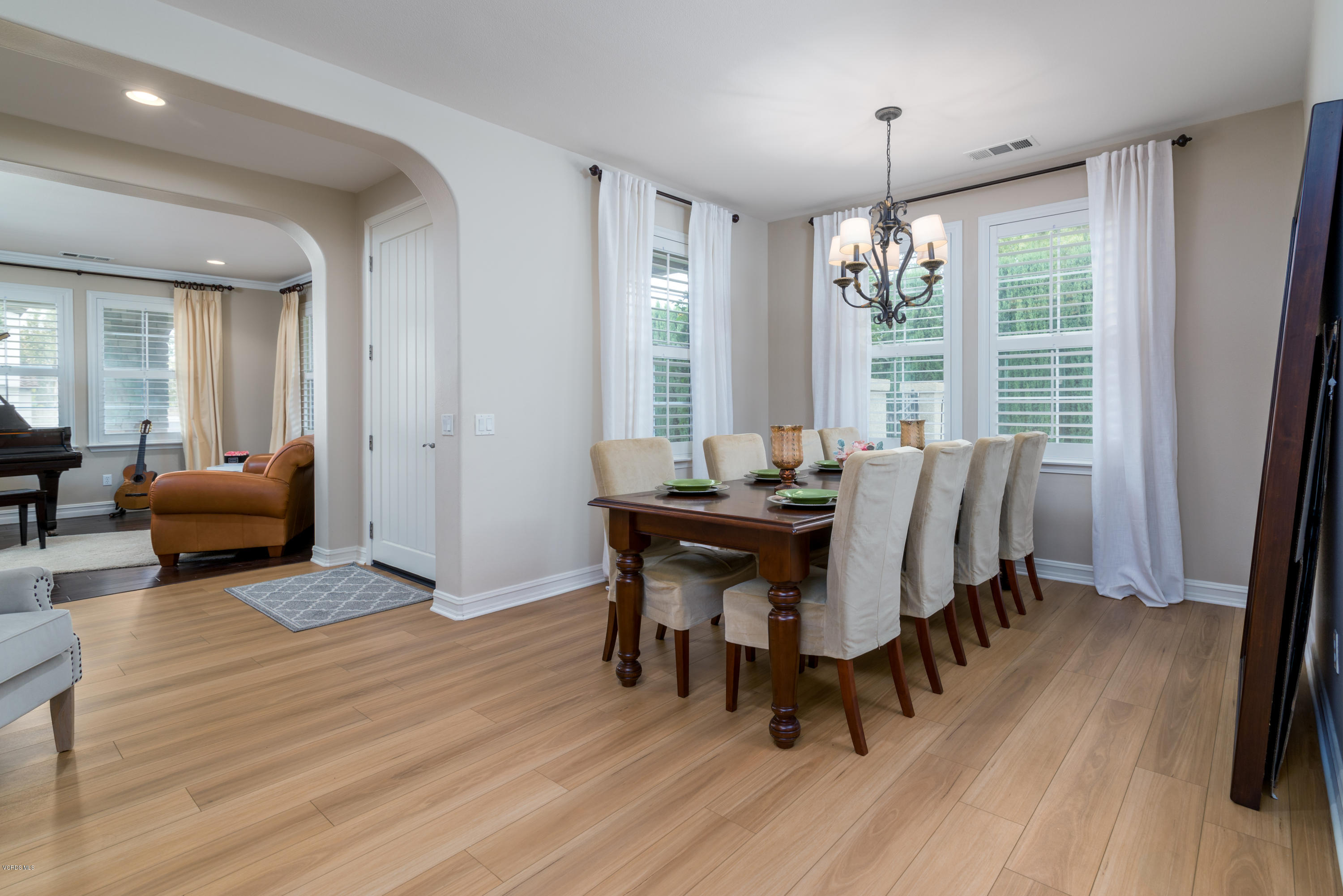 310 Spring Park Road Camarillo, CA 93012 - Photo 26 of 48 a view of a dining room with furniture window and wooden floor