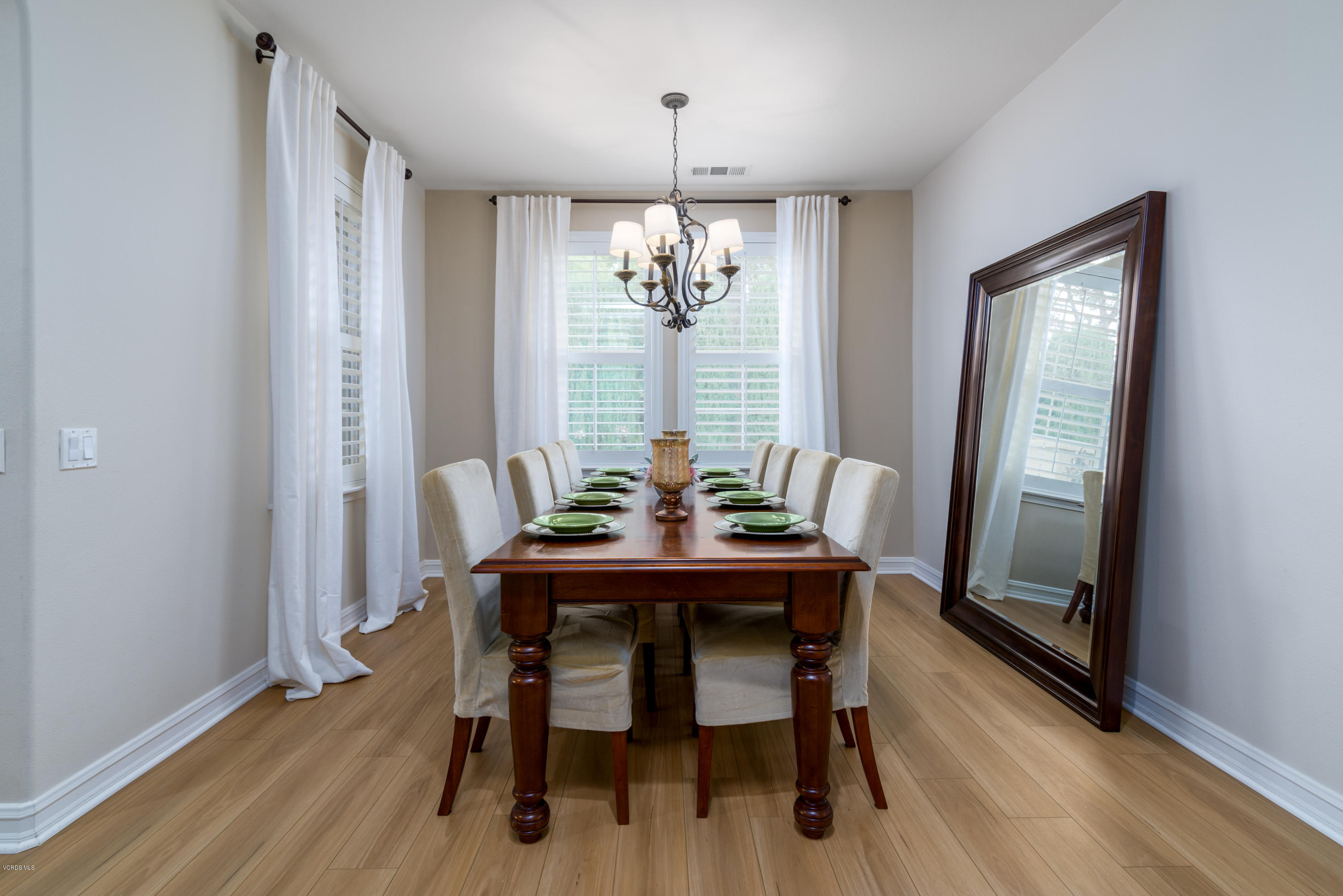 310 Spring Park Road Camarillo, CA 93012 - Photo 27 of 48 a view of a dining room with furniture window and wooden floor