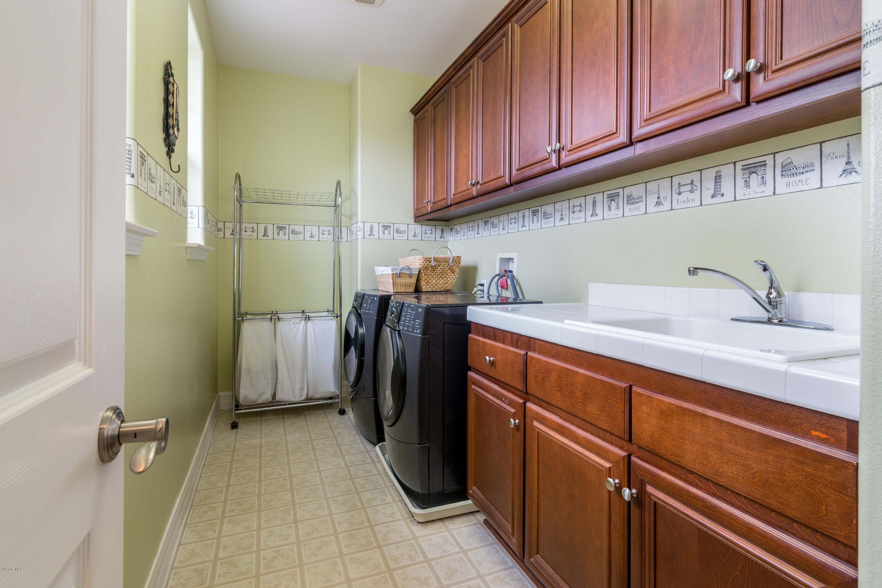 310 Spring Park Road Camarillo, CA 93012 - Photo 30 of 48 a utility room with sink dryer and washer