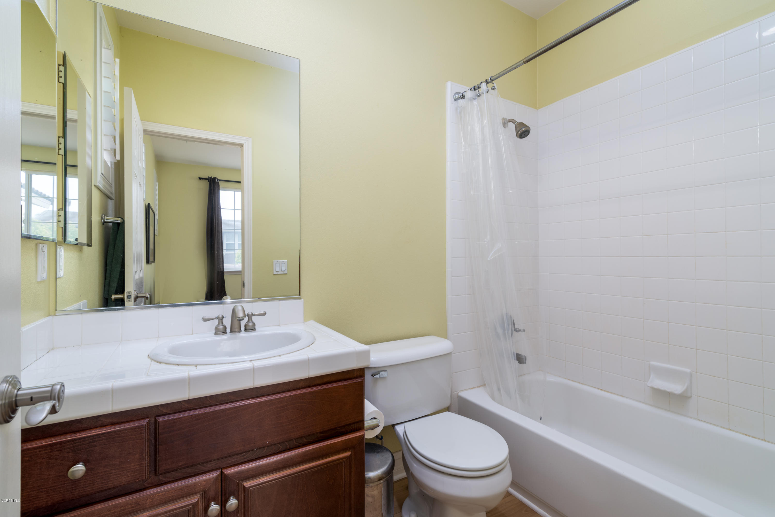 310 Spring Park Road Camarillo, CA 93012 - Photo 35 of 48 a bathroom with a sink a toilet and shower