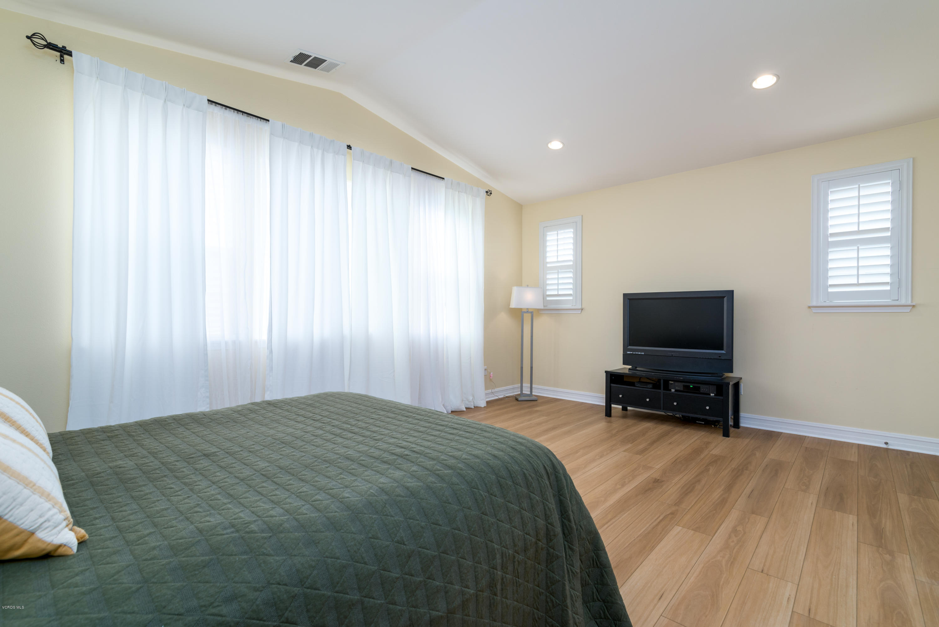310 Spring Park Road Camarillo, CA 93012 - Photo 38 of 48 a bedroom with a bed and flat screen tv