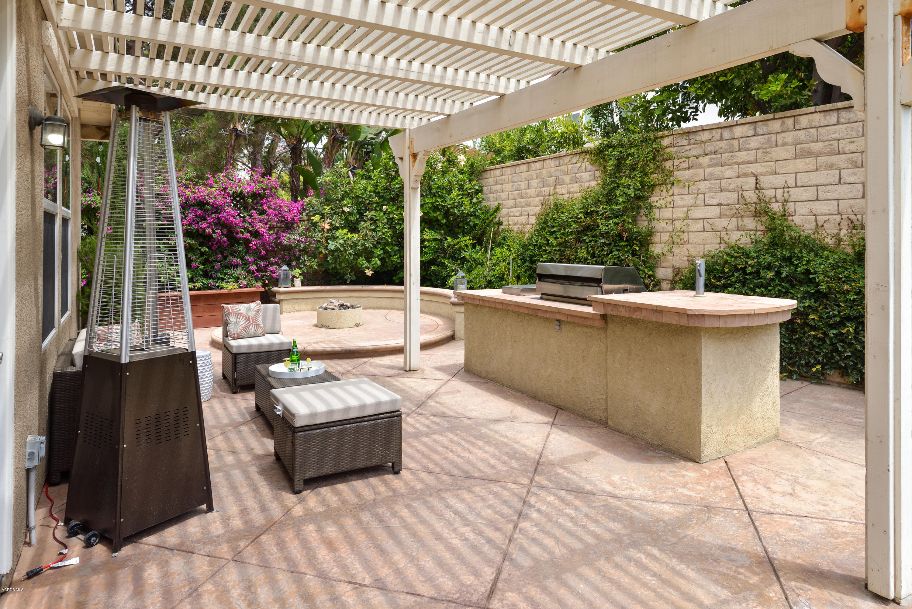 310 Spring Park Road Camarillo, CA 93012 - Photo 6 of 48 a outdoor living space with furniture and garden view