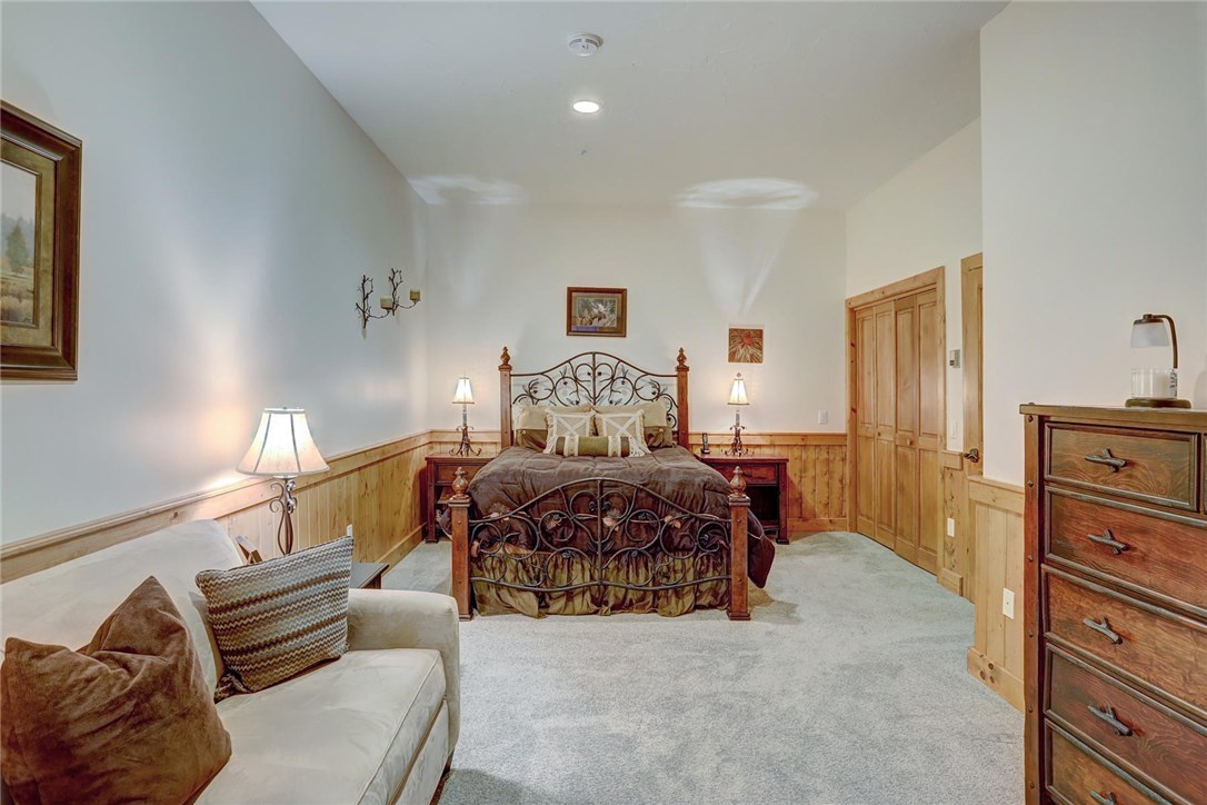 1381 Johnson Road Silverthorne, CO 80498 - Photo 26 of 35 On the lower level, this large bedroom is private and quiet. Enough room for a sitting area. Just outside the door is a full bathroom.