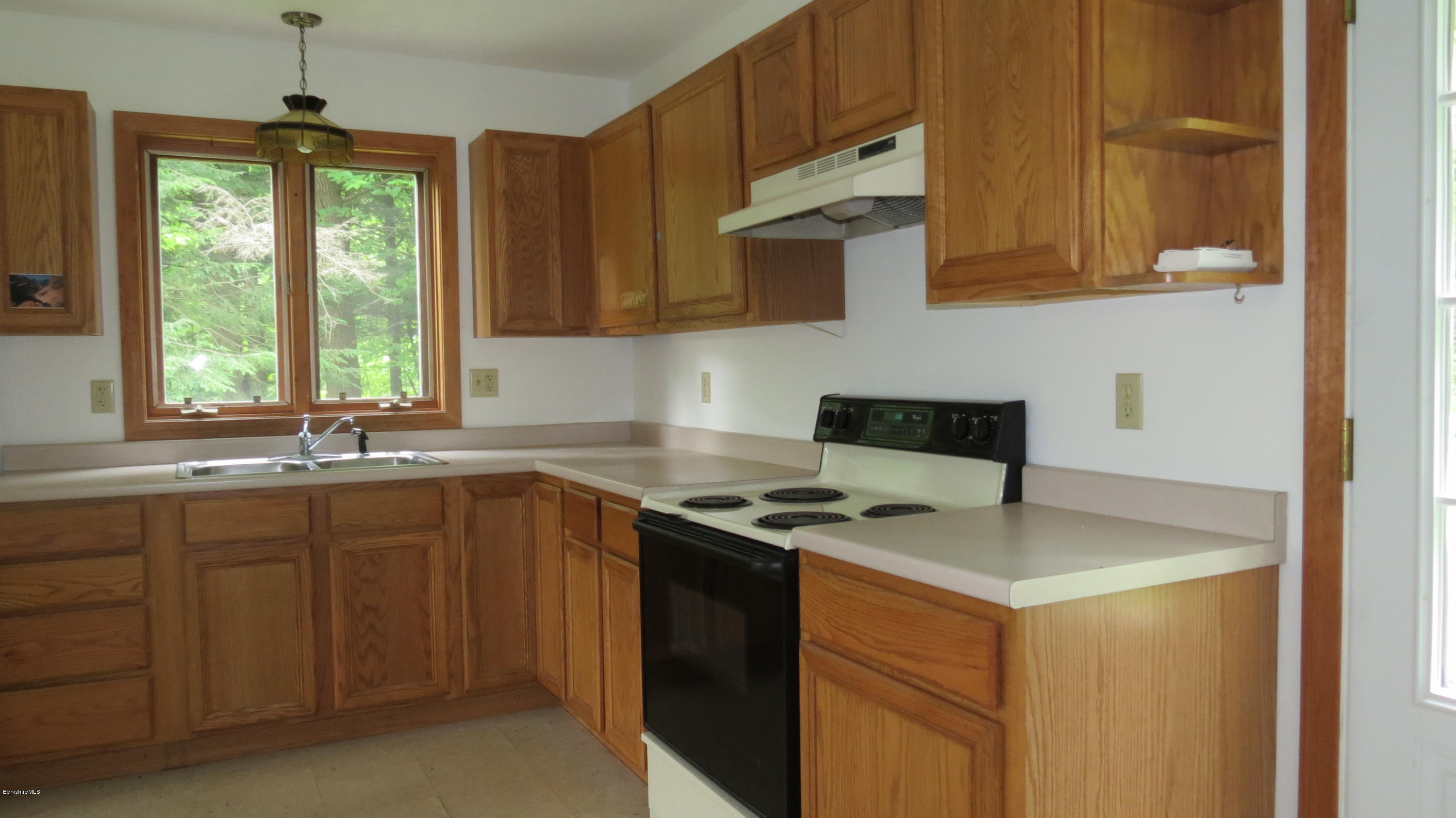 116 East Hawley Road Hawley, MA 01339 - Photo 5 of 29 a kitchen with stainless steel appliances granite countertop a sink stove and microwave