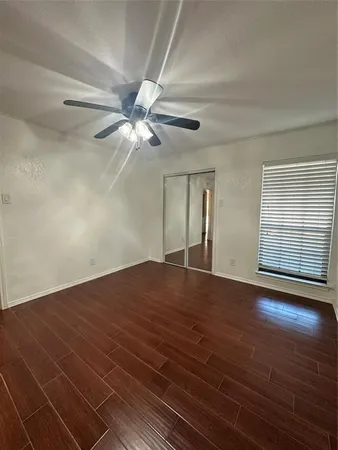 a view of a bathroom from a hallway