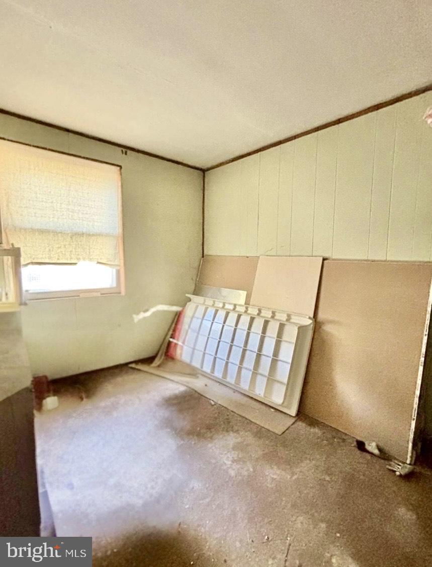171 Silver Lake Drive Clementon, NJ 08021 - Photo 15 of 25 a view of an empty room with a window