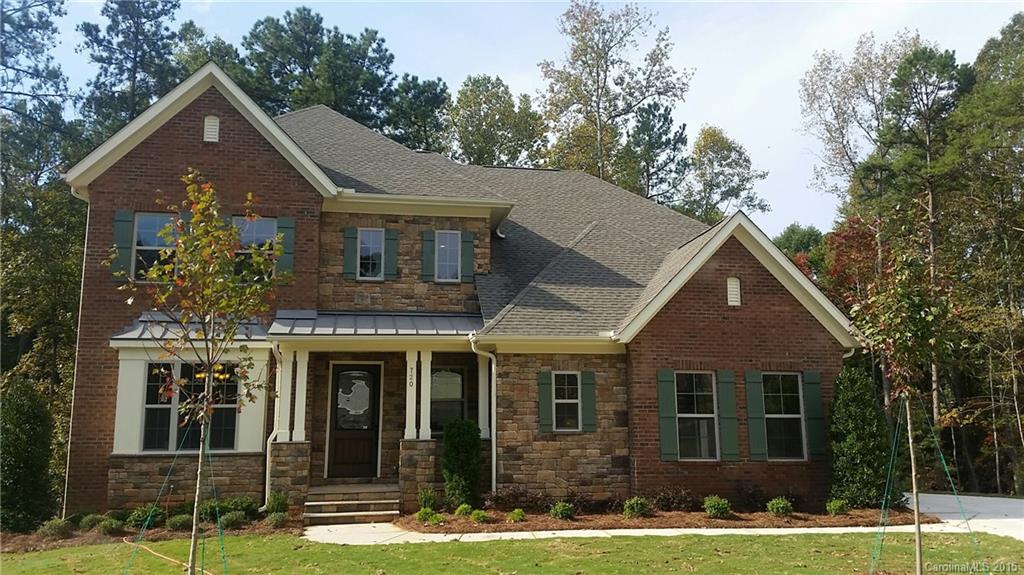 720 Chase Court, Unit 123 Fort Mill, SC 29708 - Photo 1 of 19 front view of a house with a yard